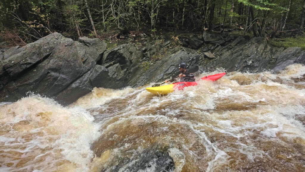 Kayaker descends a drop on the Moose River above Victory Bog Vermont Whitewater Kayaking - photo credit N Lesch-Huie
