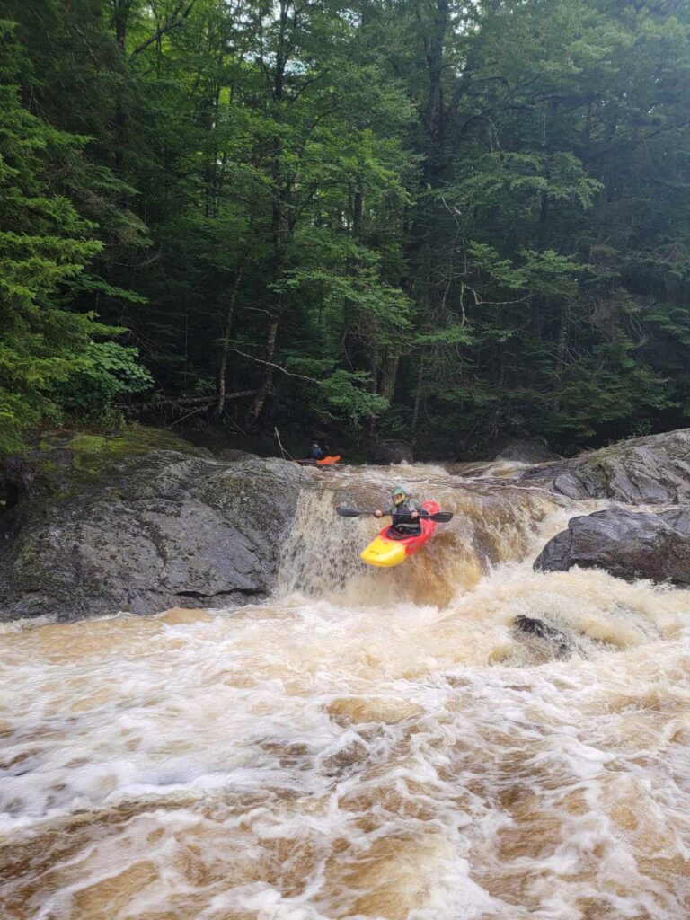 Kayaker descends a drop on the Moose River above Victory Bog Vermont Whitewater Kayaking - photo credit N Lesch-Huie