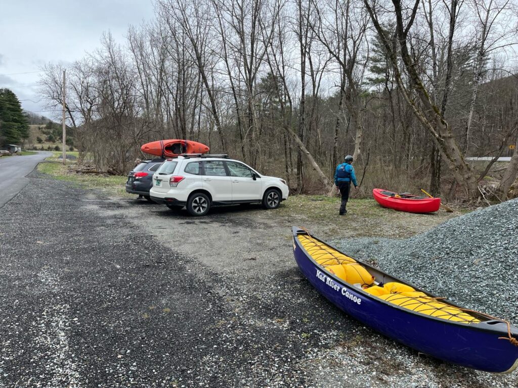 Cars, kayaks and canoes at the put in pullof on Morse Hollow Road for the Upper Poultney River Vermont Whitewater